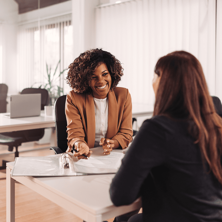 Two women having a meeting in office.
